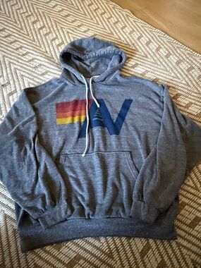 Aviator Nation Gray Hoodie with Retro Red-Orange-Yellow Stripe and Navy AV Logo